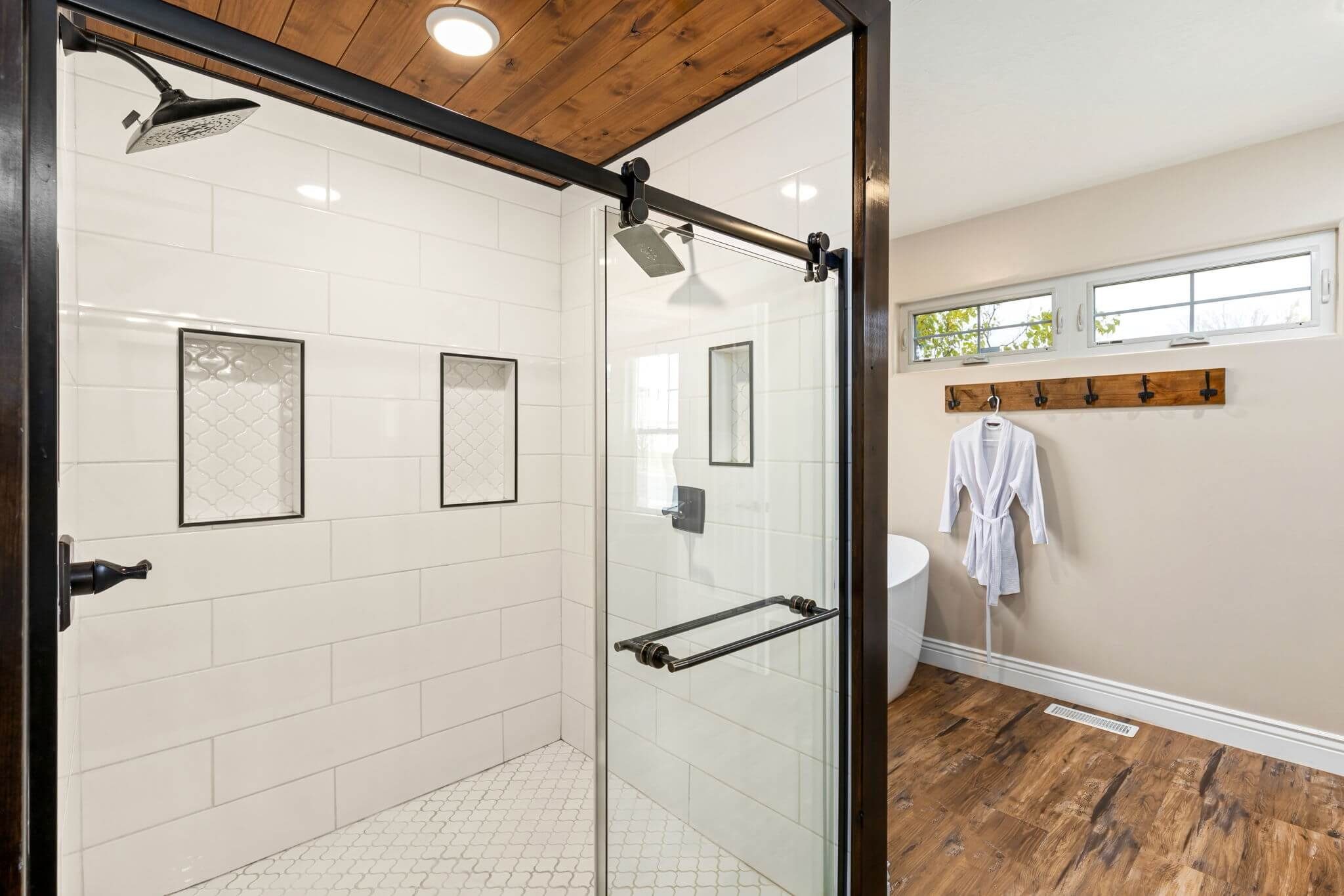 Spa-style walk-in shower in a Great Falls Montana home, showing how cleanliness, maintenance, and overall condition communicate value to buyers.