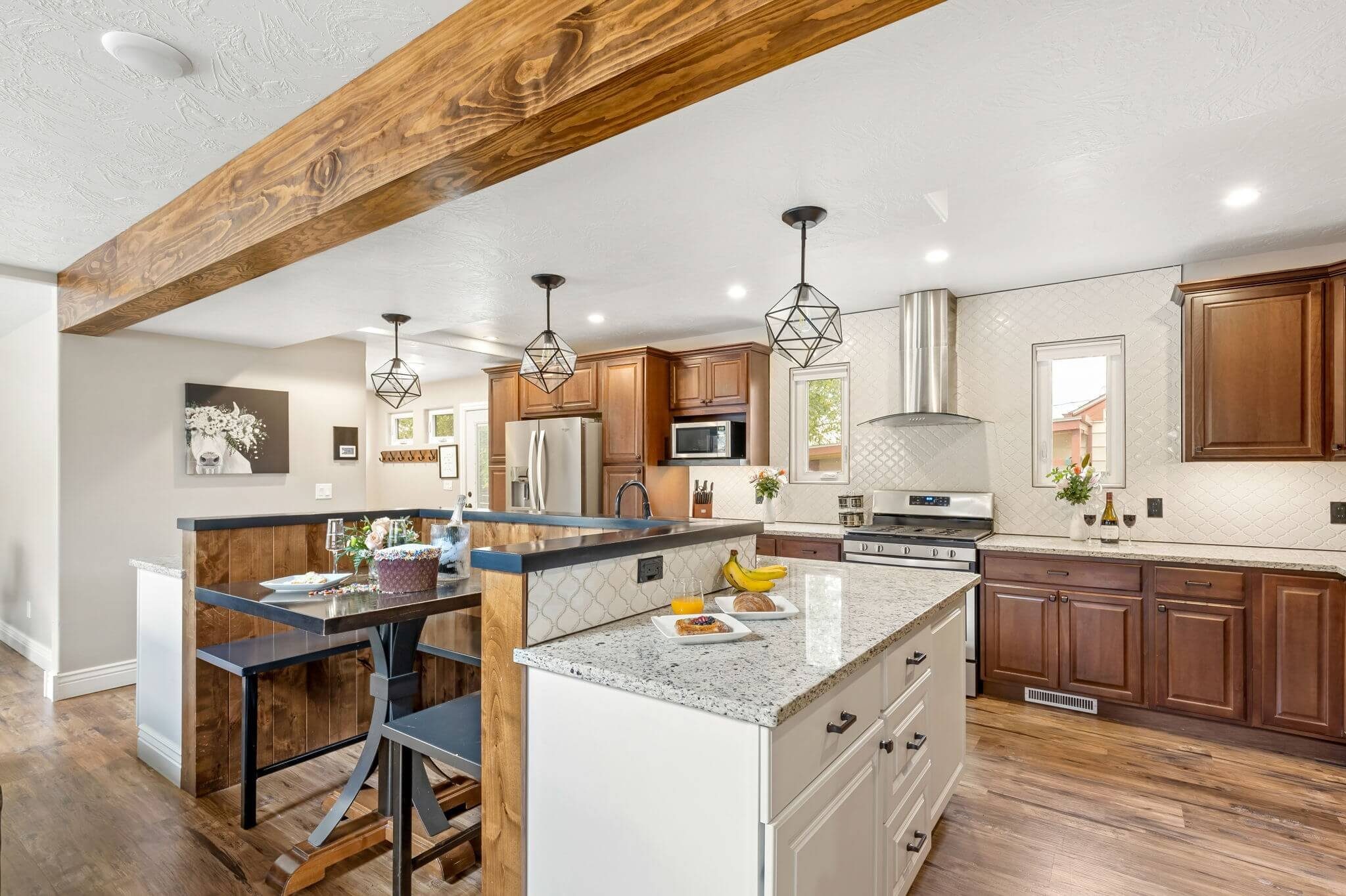 Open concept kitchen in a professionally presented Great Falls Montana home, showing how thoughtful presentation attracts buyers and increases perceived value.